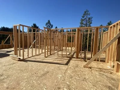 Wood stud framing for residential addition with window and door openings